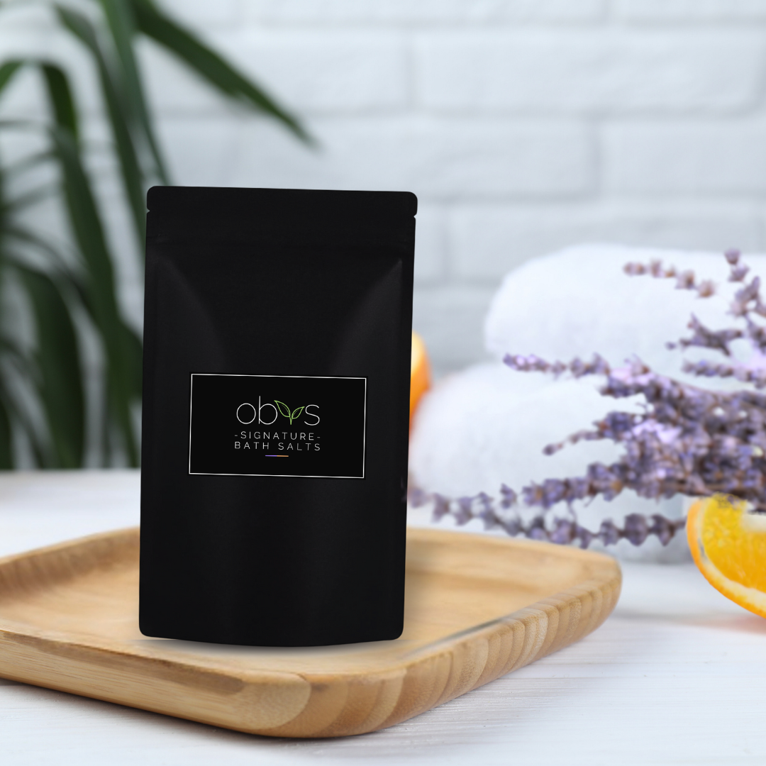Immerse yourself in the enchanting aroma of Obvs Skincare's Signature Scent Bath Salts. Our unique blend captures the essence of Obvs HQ, where the delightful fragrance of organic lavender and organic mandarin essential oils fills the air. Combined with the rejuvenating power of magnesium-rich Dead Sea salt, soothing organic gluten-free oat flour, and gentle organic arrowroot powder, this luxurious creation transports you to another land, offering a blissful escape from the everyday hustle. Let every