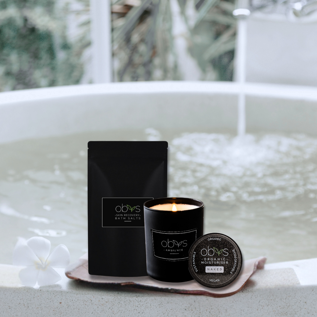 The Ambience Luxury Gift Set: Unscented candle, Skin Recovery bath salts, and Organic Naked Moisturiser. Perfect for sensitive skin and allergy-friendly care.