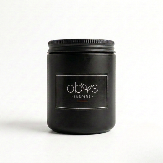 Black jar with a label on a white background