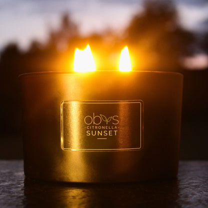Citronella Sunset Candle – 24 oz natural coconut & rapeseed wax, 3 wicks, long burn, subtle citrus aroma & safe insect repellent.