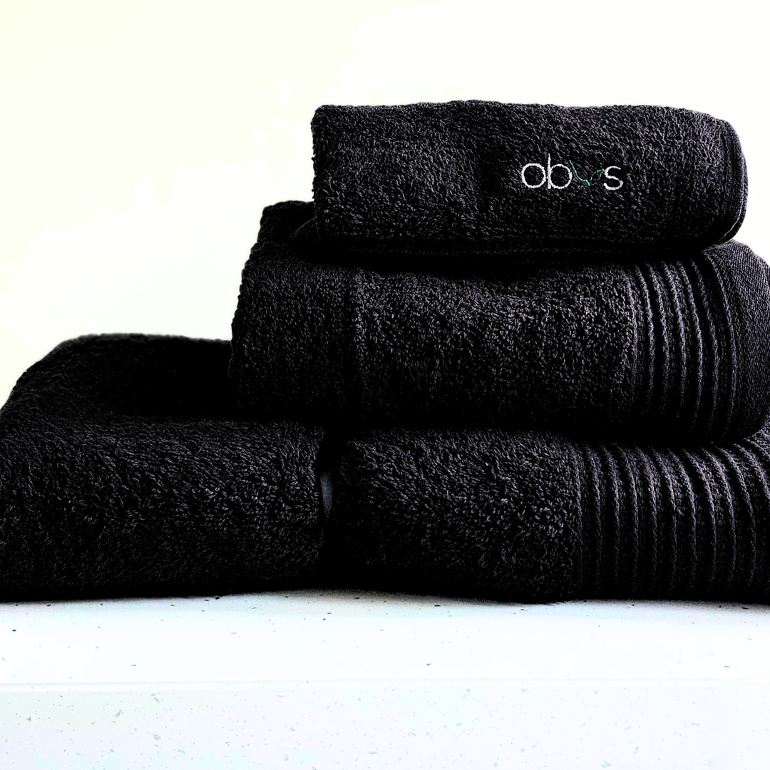 Indulge in the ultimate luxury with the Obvs at Home GOTS Certified Organic Towel Bundle. Crafted from the softest organic cotton, this collection—featuring a bath towel, hand towel, and Obvs face cloth—wraps you in pure, soothing comfort. The plush texture caresses your skin, elevating your daily ritual to an experience of serene indulgence. Eco-friendly and exquisitely soft, these towels are a true testament to sustainable luxury. Perfect for those who seek both indulgence and mindfulness in every moment.