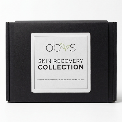 A black rectangular product box with a white front label reading 'obys SKIN RECOVERY COLLECTION' on a clean white background.