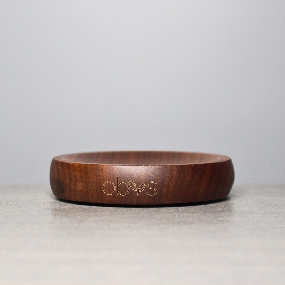 Introducing the Obvs Skincare Handcrafted Walnut Soap Dish - a blend of elegance and sustainability for your bathroom. Crafted from premium, eco-friendly walnut wood